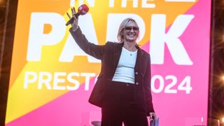 Jo Whiley introduces Snow Patrol to the stage during Radio 2 Live in the Park at Moor Park on September 7, 2024