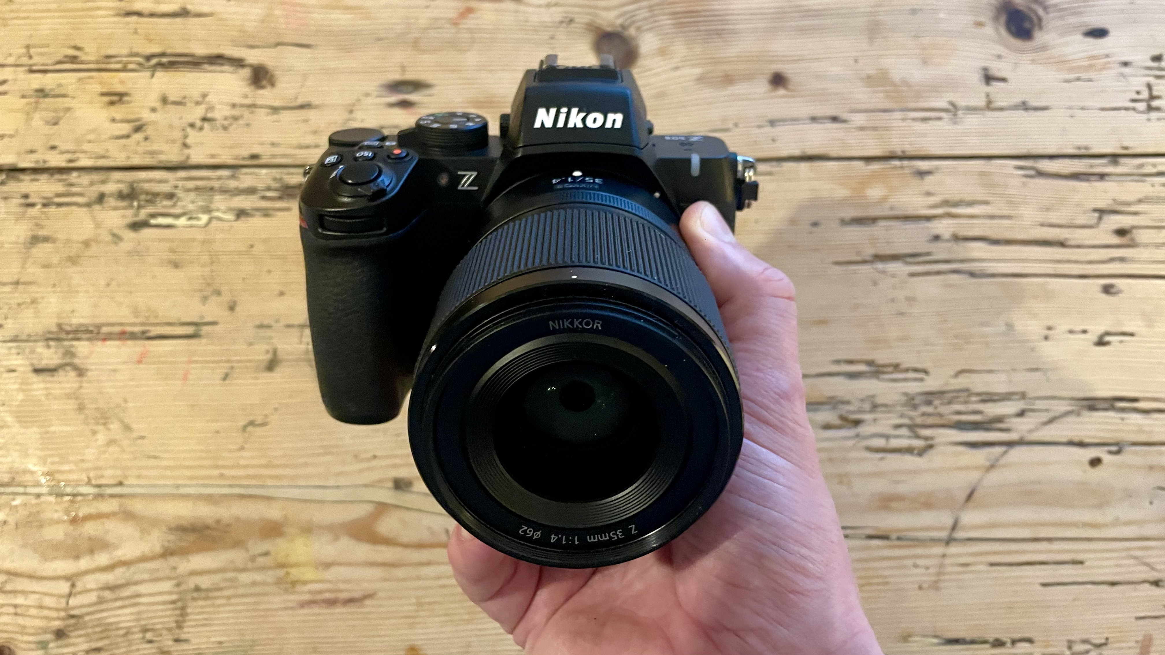 Nikon Z50 II mirrorless camera on a wooden tabletop