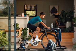 A cyclist training indoors