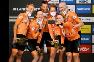 Ellen Van Dijk, Annemiek van Vleuten, Riejanne Markus, Koen Bouwman, Bauke Mollema, and Jos van Emden celebrate silver in the mixed relay 