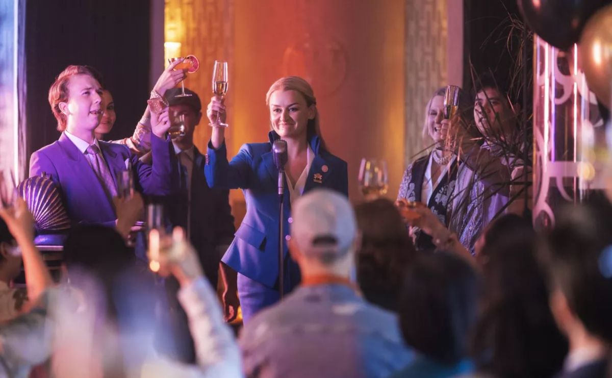 Snowpiercer cast members raising a glass to toast