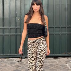 woman in leopard print pants