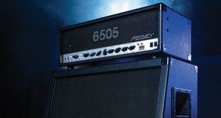 Peavey 6505 full stack, shot under stage lighting.