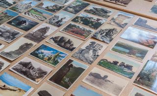 A private collection of postcards showing stone sculptures and formations from around the world