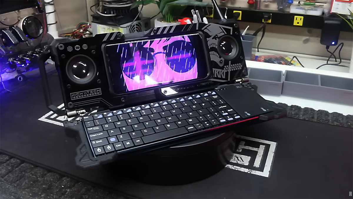 Tech modder transformed phone into his own foldable, portable Cyberdeck with integrated keyboard, speakers, and USB hub — portable PC crammed inside 3D-printed case