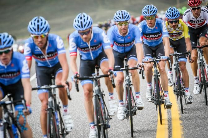 Lachlan Morton (Garmin-Sharp) stays protected by the team.