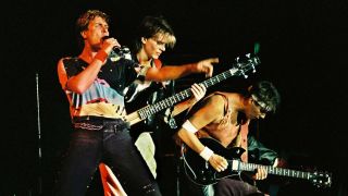 Simon Le Bon, John Taylor and Andy Taylor of Duran Duran perform on stage at Wembley Arena on December 20th, 1983 in London, England.