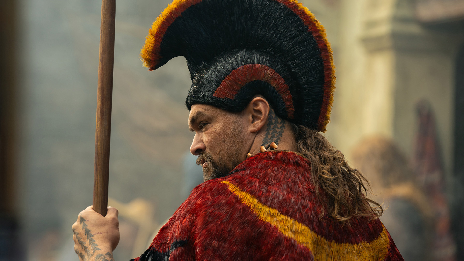 Jason Momoa in a colourful indigenous outfit