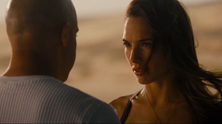 Gal Gadot looking at Vin Diesel in Fast & Furious