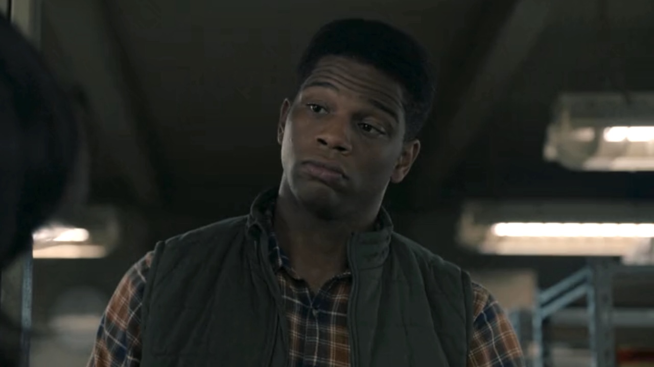 Herm looking intently at Mary Jo in NCIS: Origins