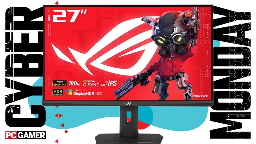 An Asus gaming monitor on a blue Cyber Monday background