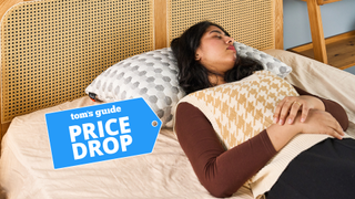 Woman sleeping on the Layla Kapok Pillow