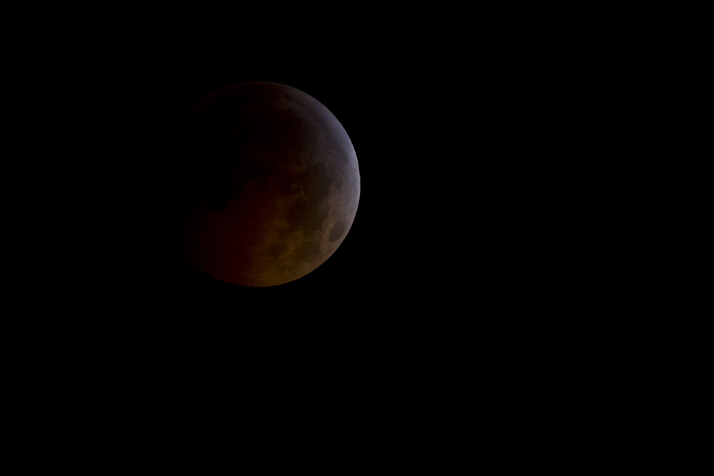 A total lunar eclipse is seen as the full moon is shadowed by the Earth on the arrival of the winter solstice, Tuesday, December 21, 2010 in Arlington, VA. From beginning to end, the eclipse lasted about three hours and twenty-eight minutes.