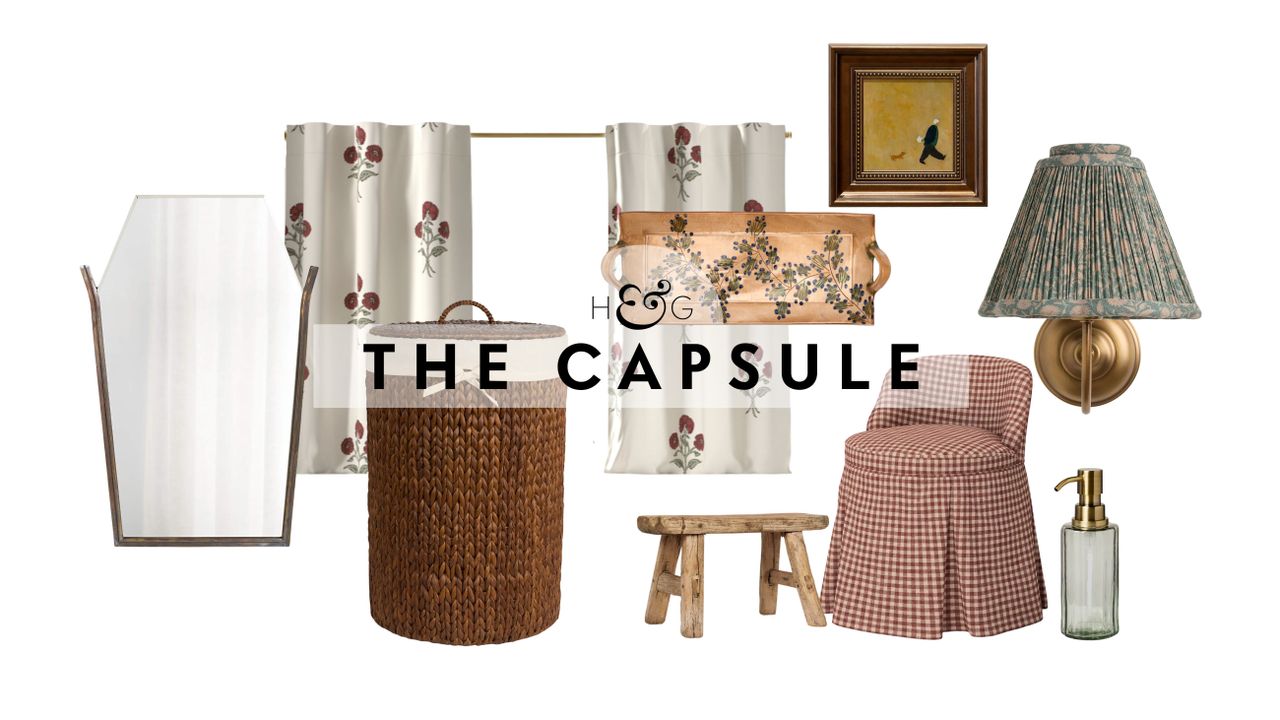 Bathroom decor that doesn&#039;t look like bathroom decor, including a characterful angled mirror, woven hamper, block printed cafe curtain duo, painted ceramic tray, vintage wooden stool, gingham skirted vanity chair, antique-inspired artwork, wall sconce with a pleated shade, and green glass soap pump