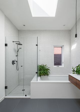 bathroom with grid tiles in Toronto townhouse
