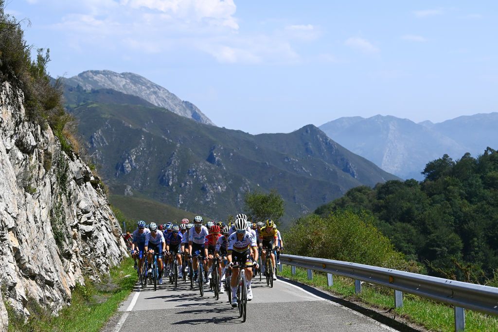 LES PRAERESNAVA SPAIN AUGUST 28 Julian Alaphilippe of France and Team QuickStep Alpha Vinyl with teammates lead the peloton passing through the Alto del Torno 533m during the 77th Tour of Spain 2022 Stage 9 a 1714km stage from Villaviciosa to Les Praeres Nava 743m LaVuelta22 WorldTour on August 28 2022 in Les Praeres Nava Spain Photo by Tim de WaeleGetty Images