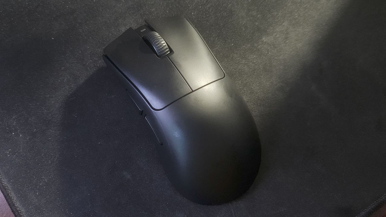 A Razer DeathAdder V4 Pro on a desk