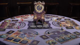 Queen by Midnight board, components, cards, and clock on a table with a purple tablesheet