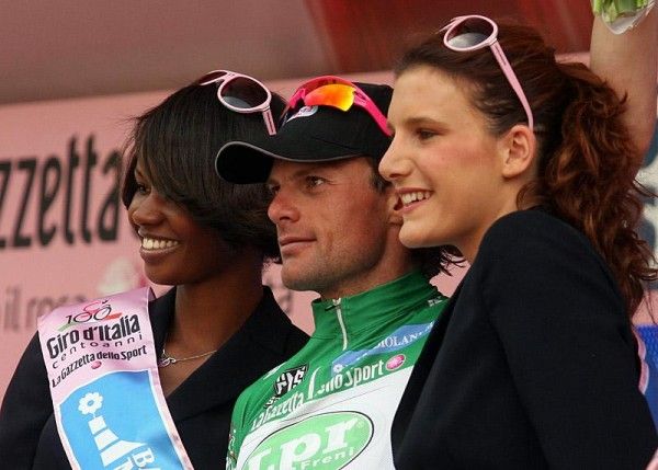 Danilo Di Luca dons the green jersey for leading the mountains classification.