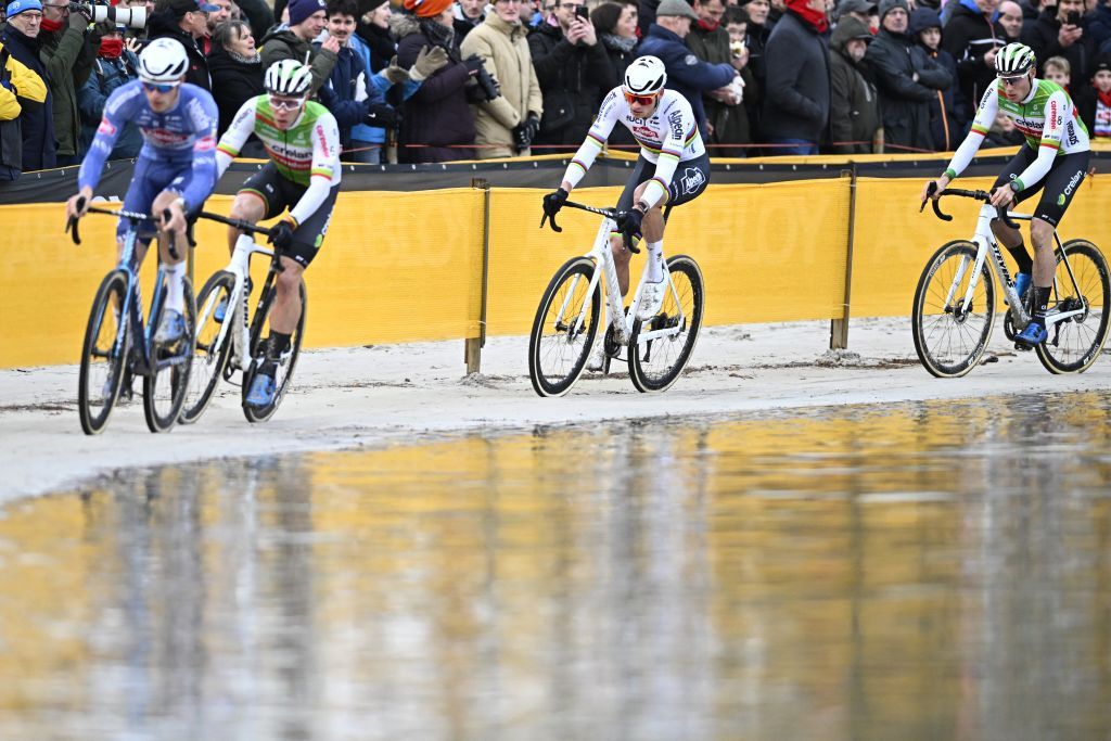 Belgian Niels Vandeputte, Belgian Joran Wyseure, Belgian Laurens Sweeck and Dutch Mathieu Van Der Poel pictured during the men's elite race of the superprestige cyclocross cycling event, race 5 out of 8, Monday 23 December 2024 in Mol.
BELGA PHOTO JASPER JACOBS (Photo by JASPER JACOBS / BELGA MAG / Belga via AFP)