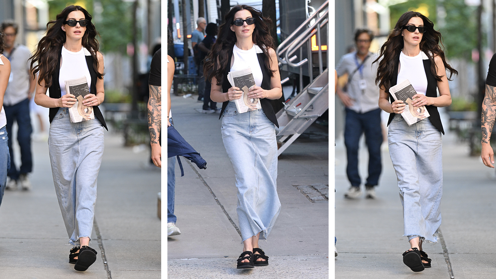 Anne Hathaway wearing a denim skirt, white tank top and waistcoat