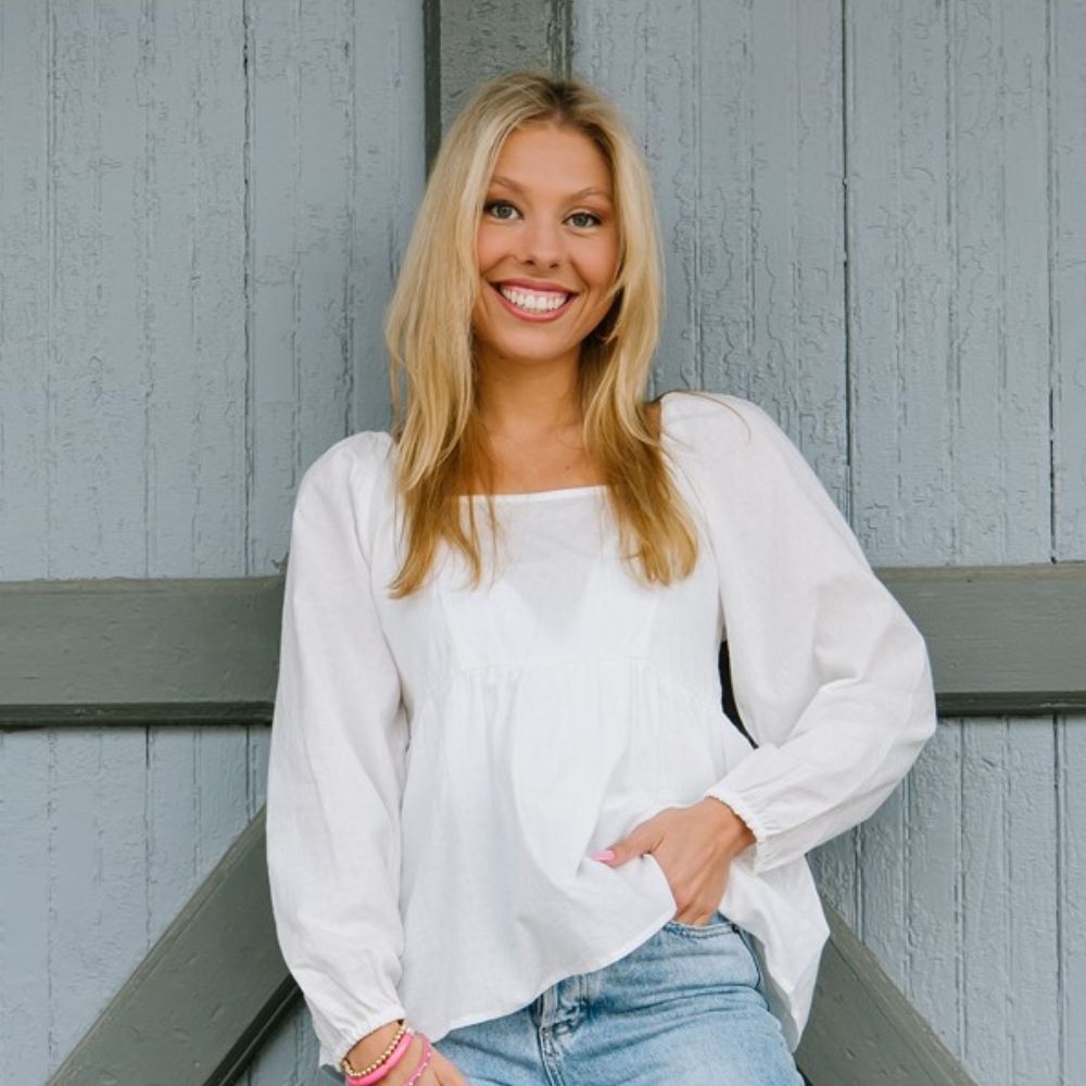 A headshot of Caitlyn Grubb
