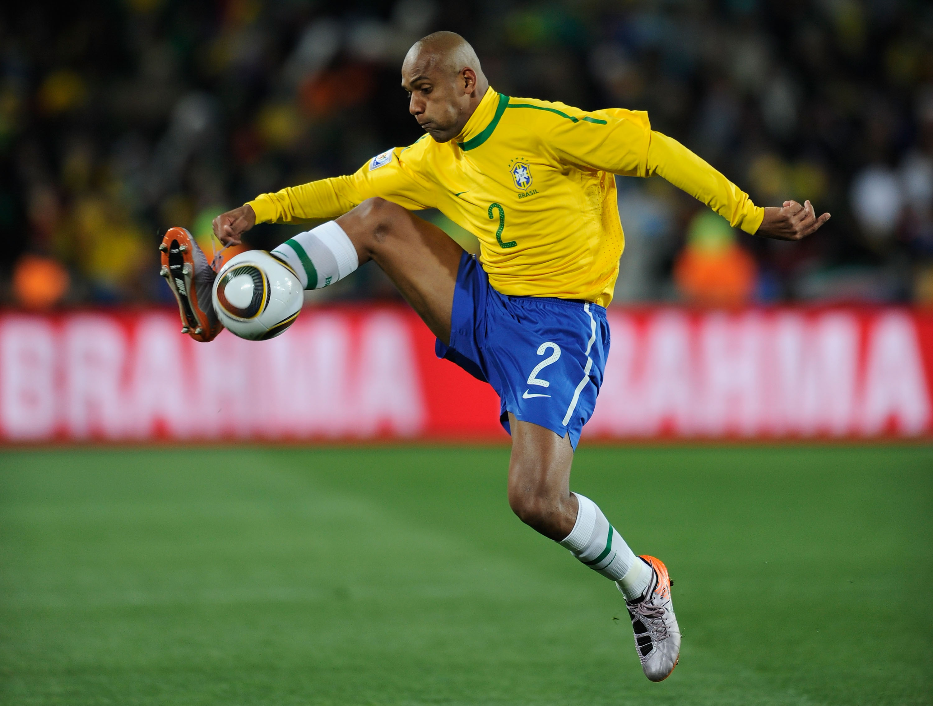 Maicon in action for Brazil against North Korea at the 2010 World Cup.