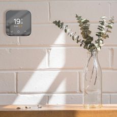 hive thermostat mini on white wall