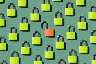 lots of lime-coloured padlocks set against a green background, with one orange padlock in the middle that's unlocked