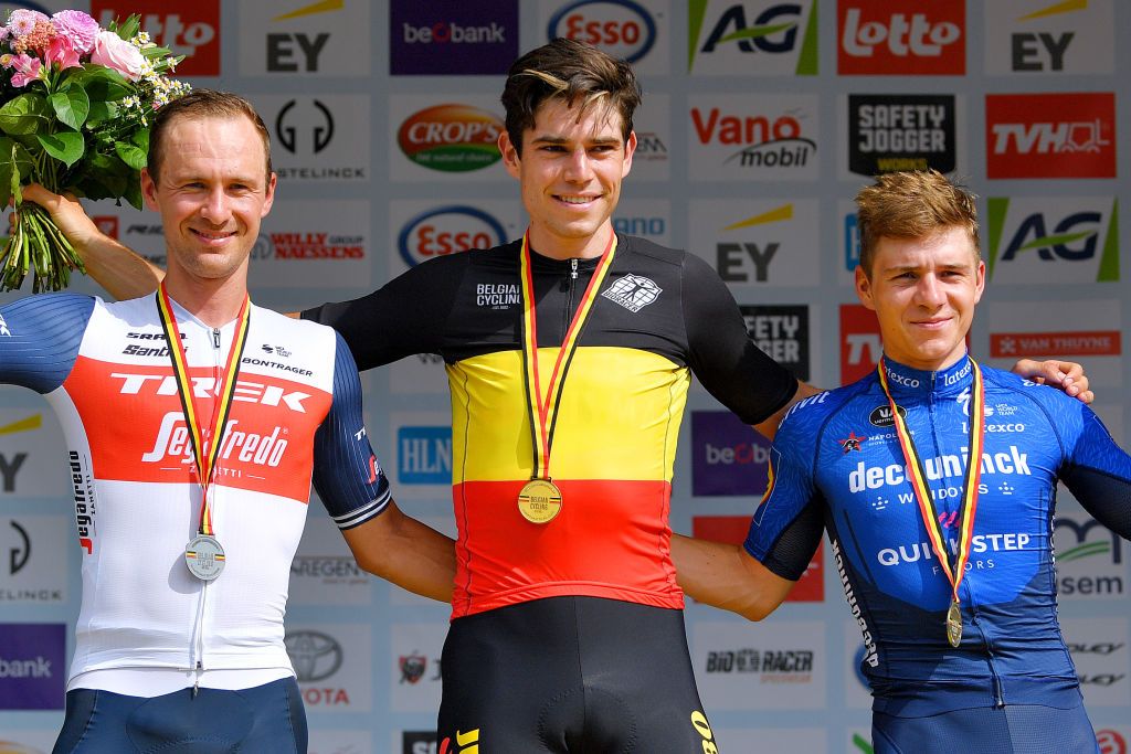 WAREGEM BELGIUM JUNE 20 Edward Theuns of Belgium Silver medal Wout Van Aert of Belgium Gold Medal Belgian Champion Jersey Remco Evenepoel of Belgium Bronze medal celebrates at podium during the 122th Belgian Road Championship 2021 Mens Road Race a 2213km one day race from Waregem to Waregem BELCycling belgiancycling on June 20 2021 in Waregem Belgium Photo by Luc ClaessenGetty Images
