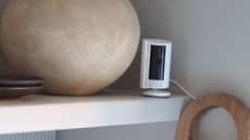 a ring indoor camera on a shelf