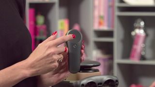 The controller features a trackpad