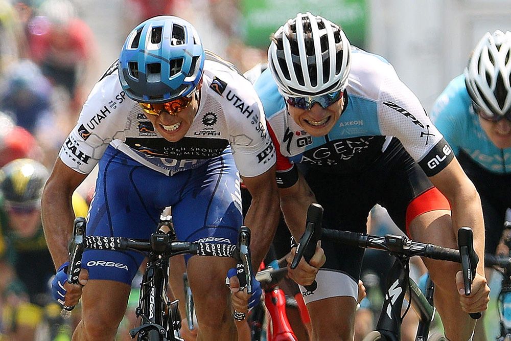 Travis McCabe (UnitedHealthcare) and Jasper Philipsen (Hagens Berman Axeon) clash in sight of the line