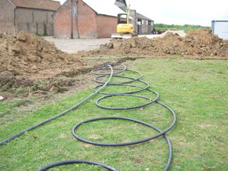 a ground source heat pump during installation