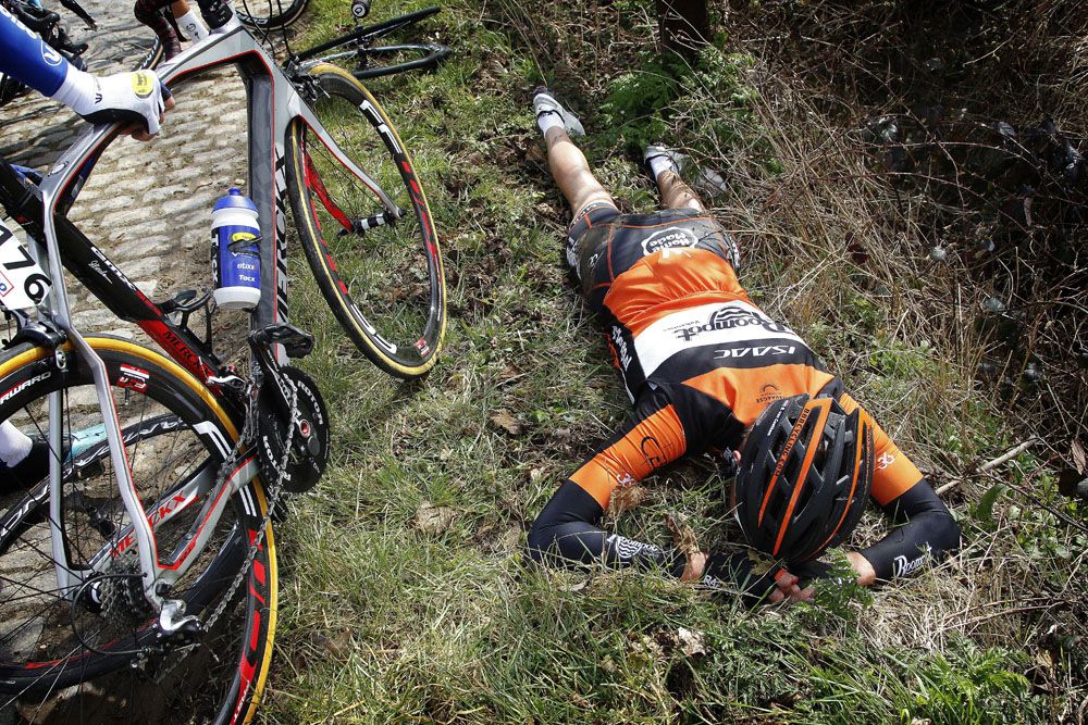 Brian Van Goetham lies face first down in the mud