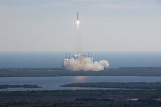 SpaceX's Falcon 9 rocket and Dragon spacecraft lift off from Launch Complex 40 at Cape Canaveral Air Force Station at 10:43 a.m. EST in this photo taken Dec. 8, 2010 during the key space capsule flight test for NASA's commercial orbital space transportation program.