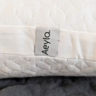 A close up of the Aeyla Adjustable FOAMO Pillow cover