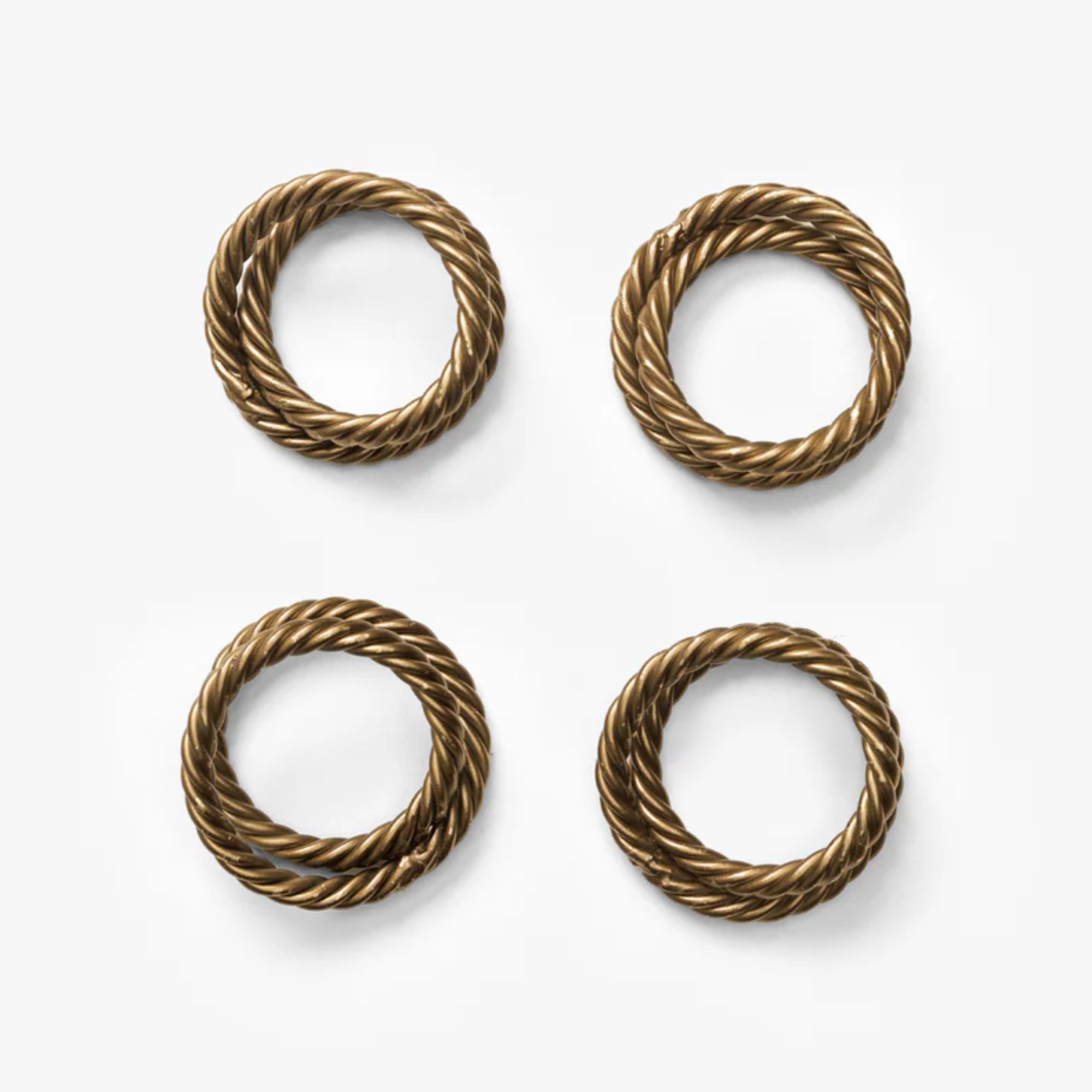 Brass napkin rings with rope-style detail