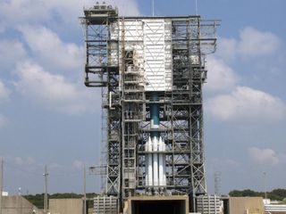 At NASA's Space Launch Complex 17B in Florida, the first and second stages of a Delta II launch vehicle and its nine solid rocket boosters are visible in the mobile service tower on May 10, 2011. The Delta II will launch NASA's Gravity Recovery and Interi