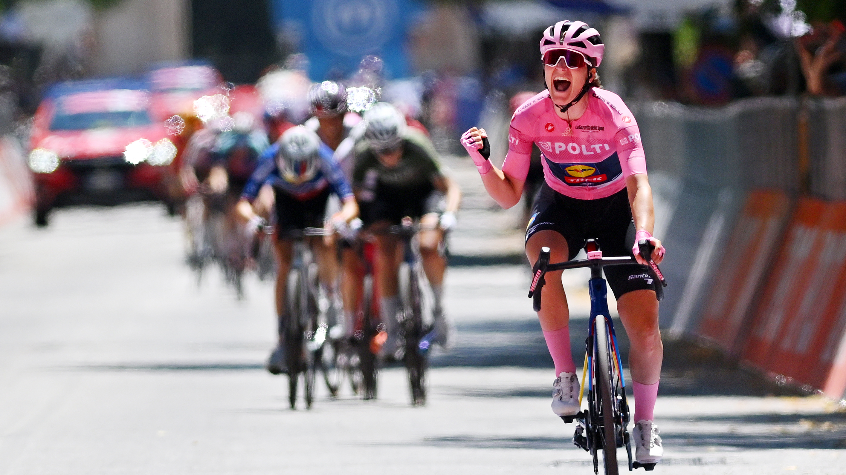 L'AQUILA, ITALY - JULY 14: (EDITOR'S NOTE: Alternate crop) Elisa Longo Borghini of Italy and Team Lidl - Trek - Pink Leader Jersey celebrates at finish line as overall race winner during the 35th Giro d'Italia Women 2024, Stage 8 a 117km stage from Pescara to L'Aquila / #UCIWWT / on July 14, 2024 in L'Aquila, Italy. (Photo by Luc Claessen/Getty Images)