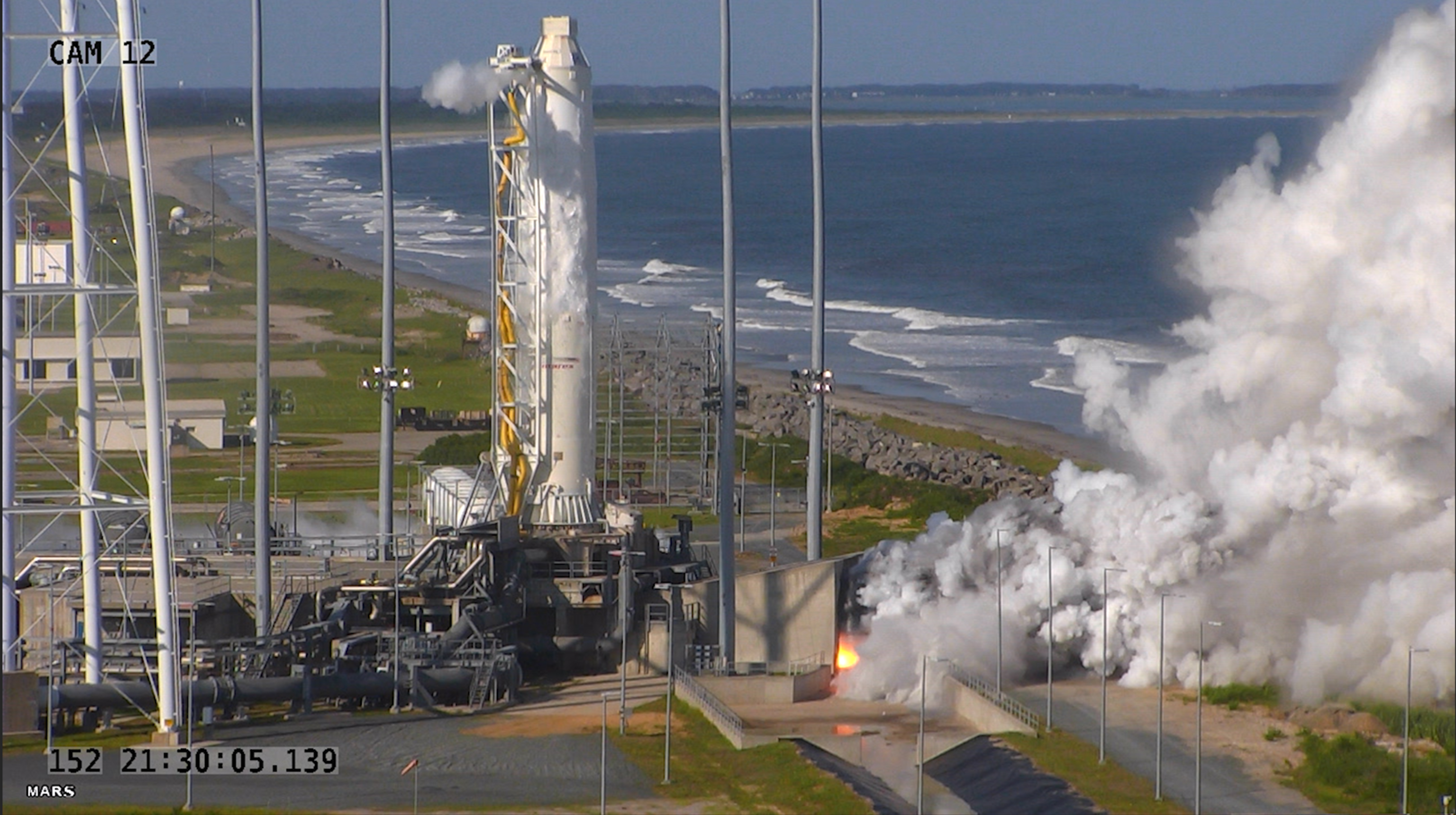 An Orbital ATK Antares rocket first stage fires its RD-181 main engines during a static-fire test May 31 at Wallops Island, Virginia.