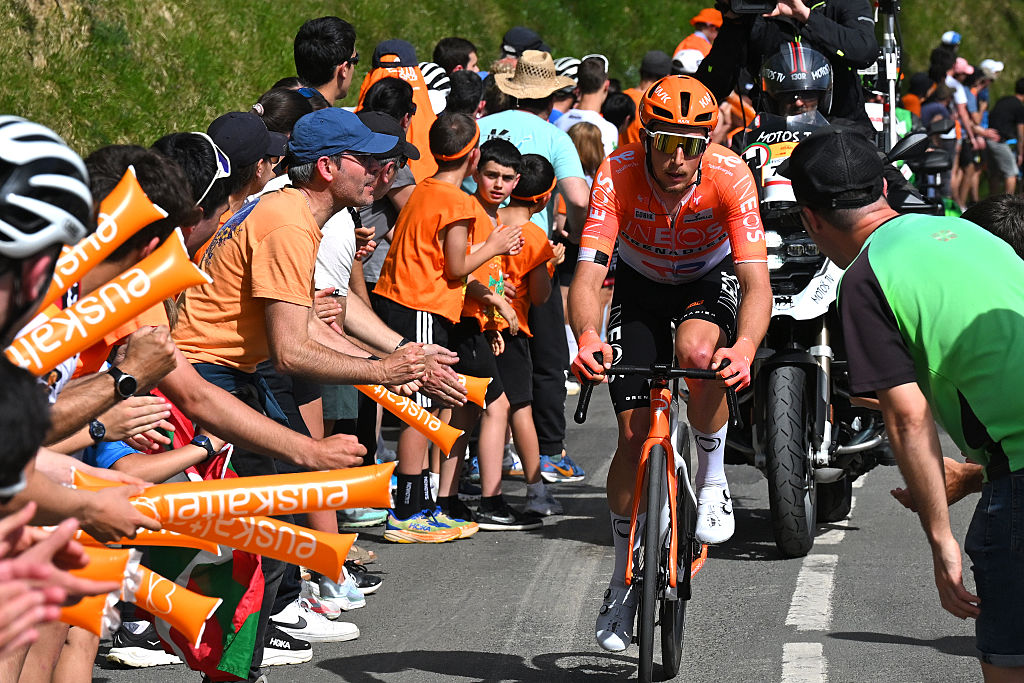EIBAR, SPAIN - APRIL 10: Kevin Vauquelin of France and Team INEOS Grenadiers competes in the breakaway while fans cheer during the 65th Itzulia Basque Country 2026, Stage 5 a 176.2km stage from Eibar to Eibar / #UCIWT / on April 10, 2026 in Eibar, Spain. (Photo by Tim de Waele/Getty Images)