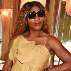 Serena Williams wore a turmeric yellow sun dress from Farm Rio in London