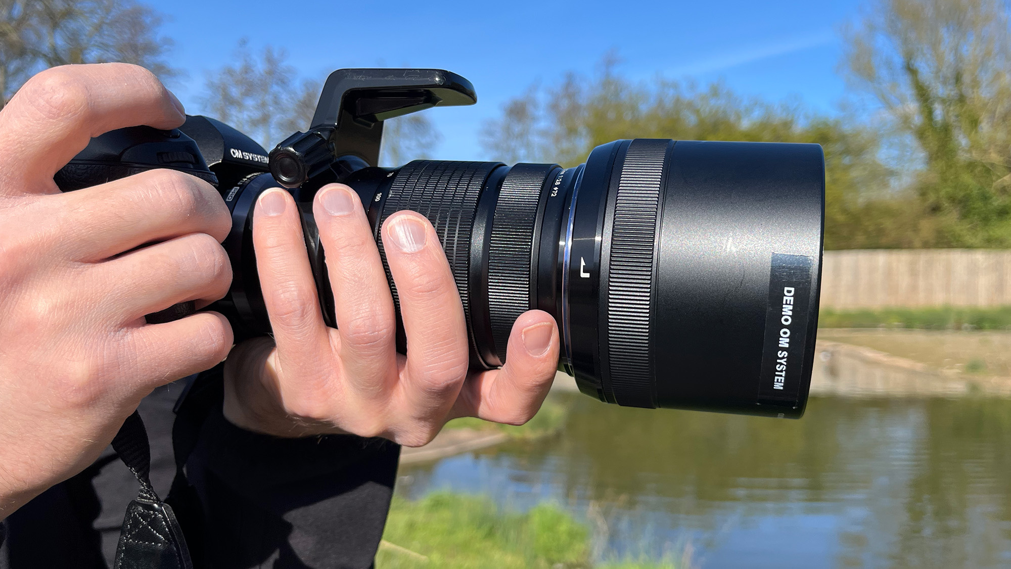 Mike Harris with M.Zuiko Digital ED 40-150mm f/2.8 PRO in rural setting with blue sky