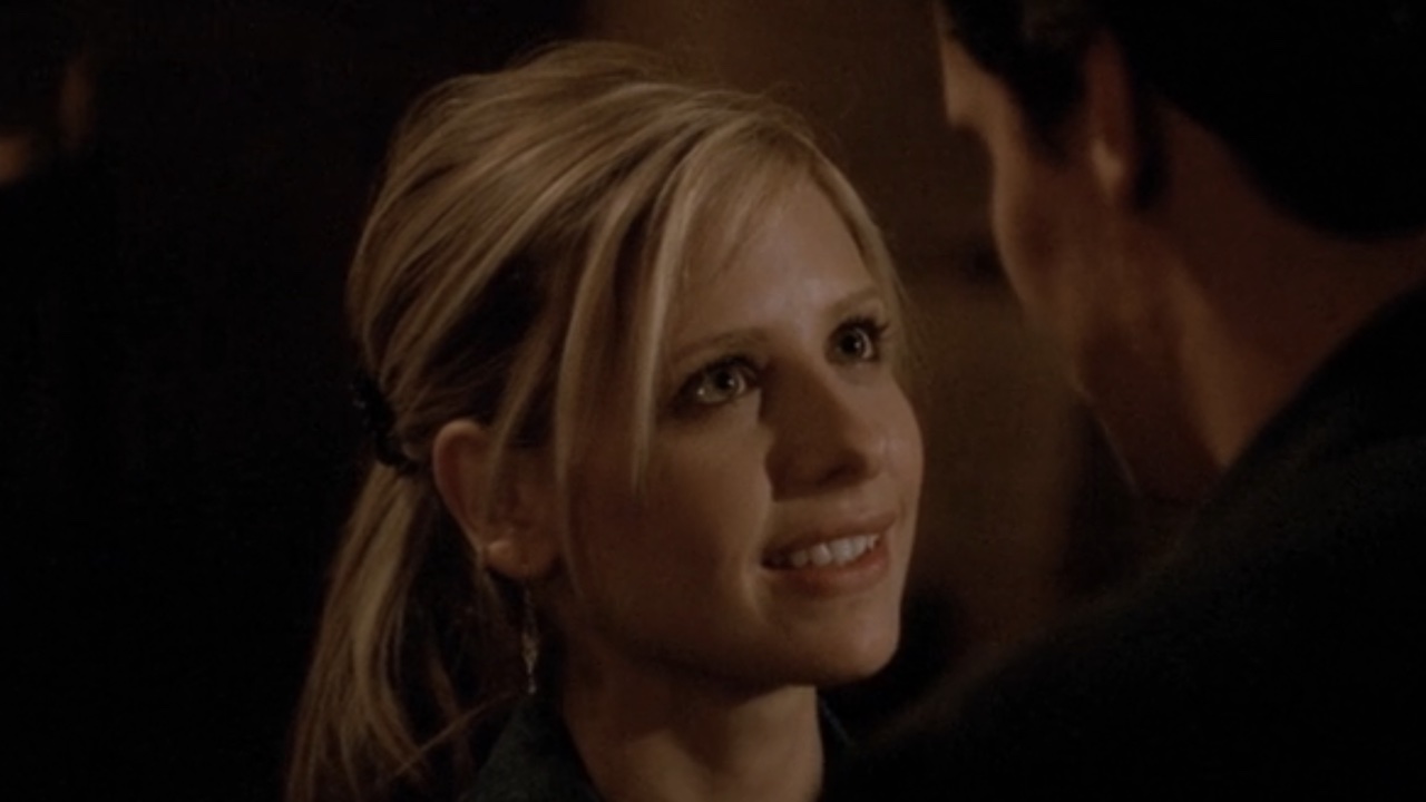 Buffy smiling at Angel in the series finale