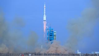 A photo of a rocket taking off from a launch pad in China