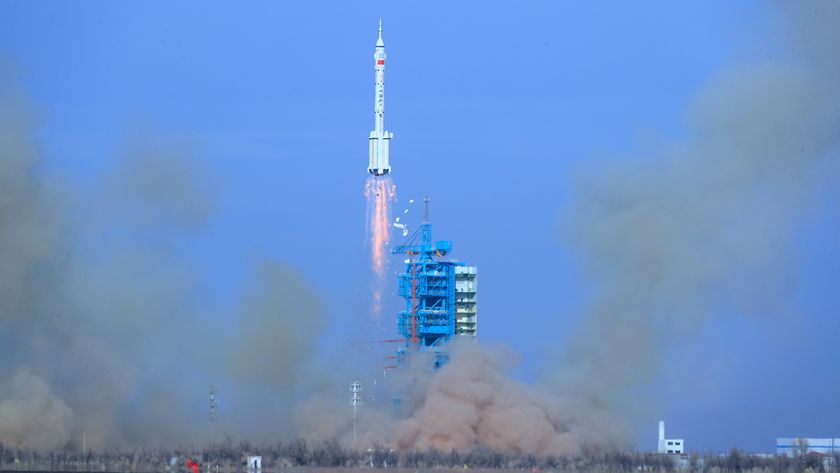 A photo of a rocket taking off from a launch pad in China