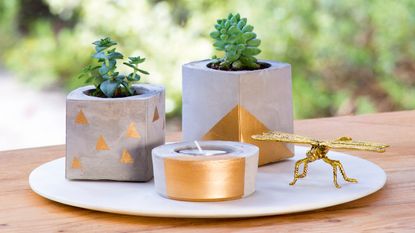 Cement planters, gold tealight