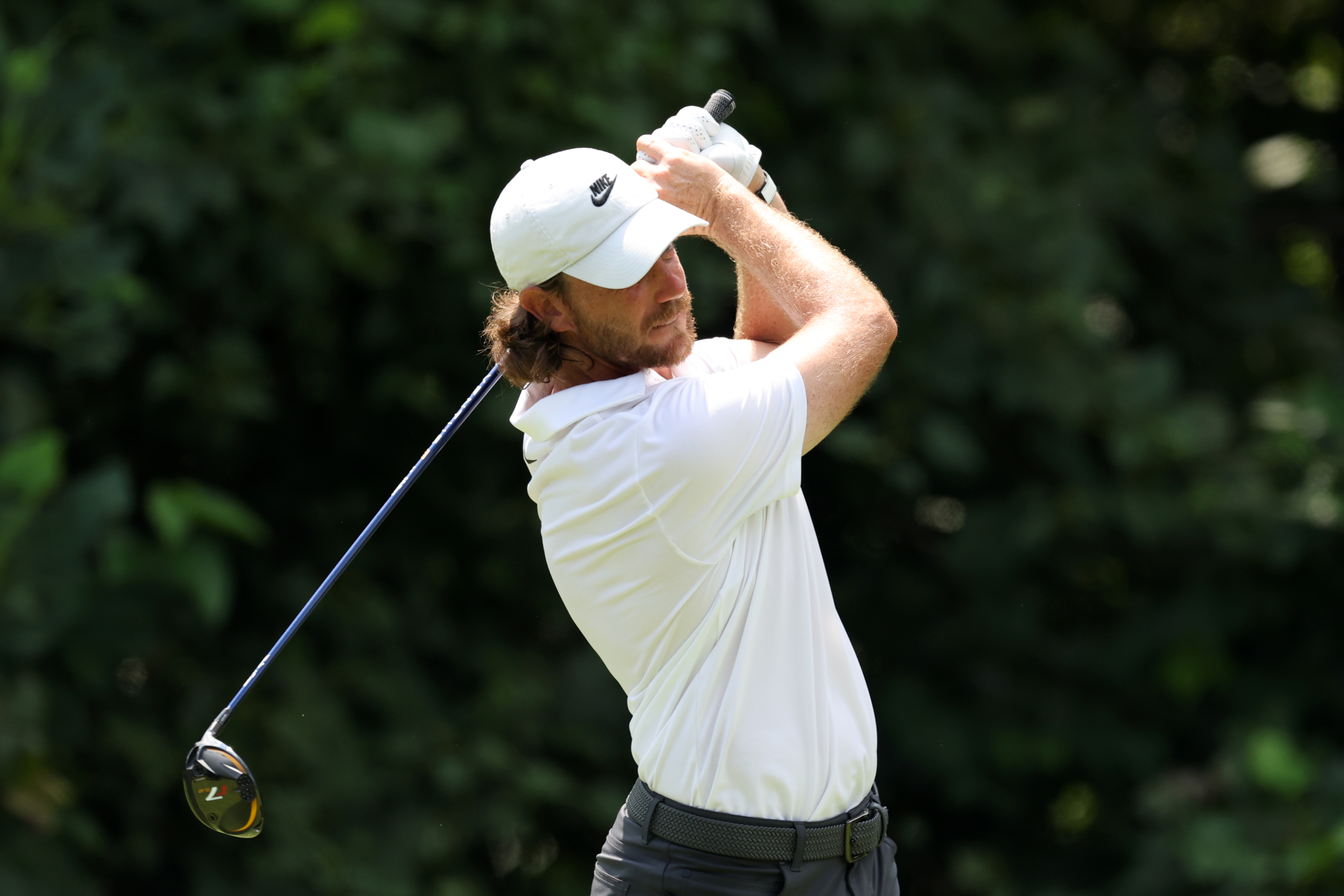 Tommy Fleetwood hits a mini driver off the tee
