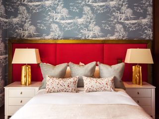 bedroom with colourful headrest and wallpaper at No.1 Grosvenor Square